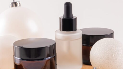 a set of cosmetic jars with cream serum for face and body