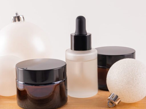 a set of cosmetic jars with cream serum for face and body